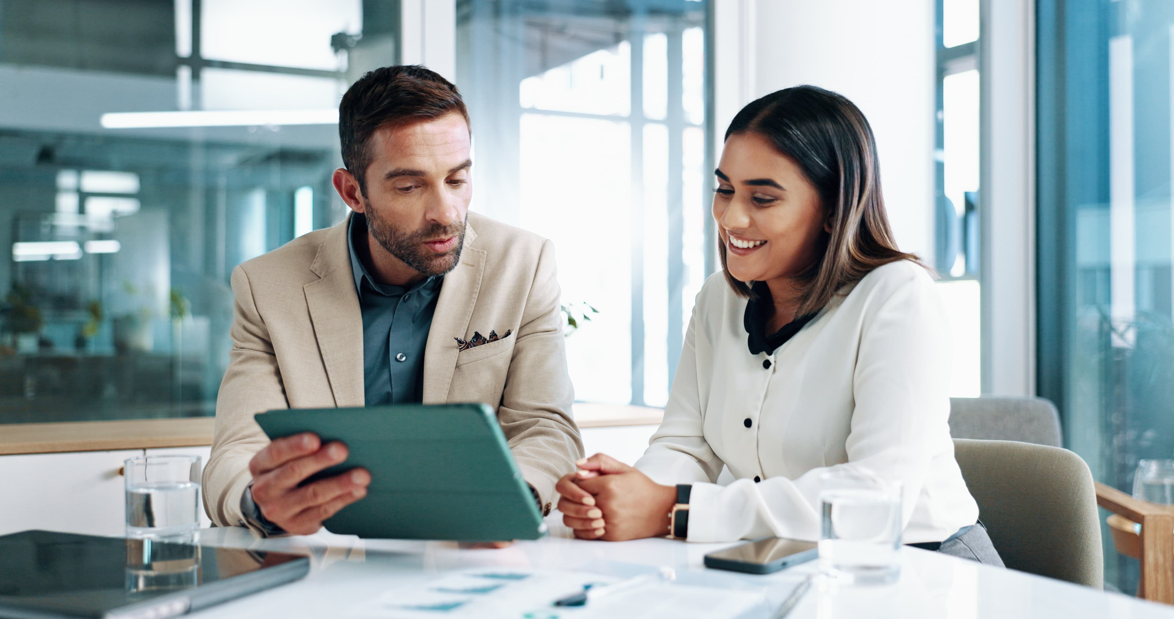 Business advisor guiding a client through financial planning